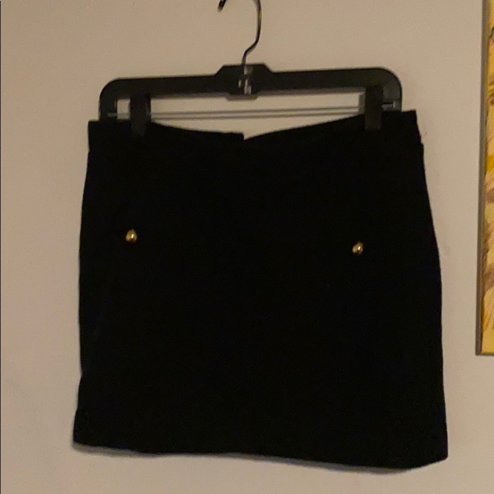 Black skirt with gold hardware